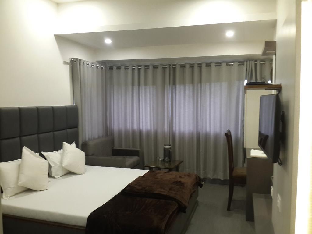 Hotel Oasis Mumbai Oda fotoğraf