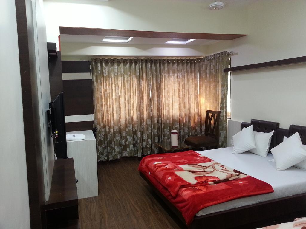 Hotel Oasis Mumbai Oda fotoğraf